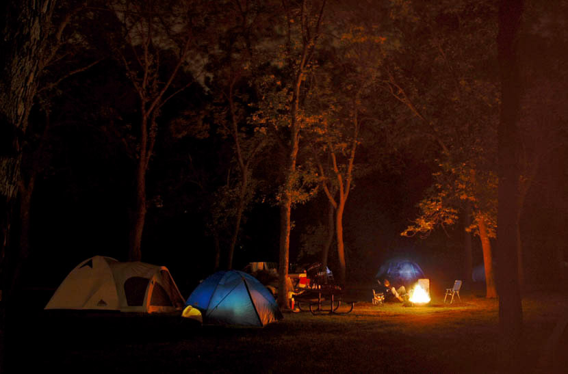 Night scene of campsite with fire