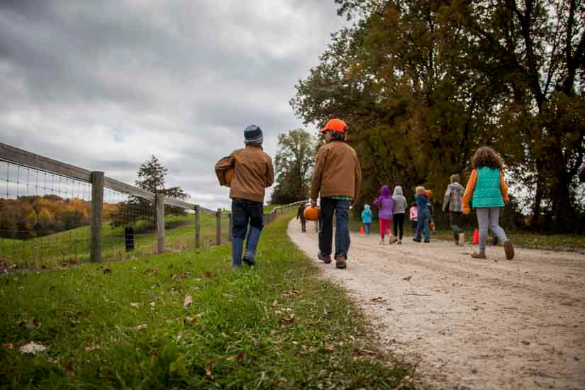 Children hiking farm trail