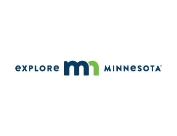 Explore Minnesota logo with state navy and green "mn" logo above "Explore Minnesota" text.