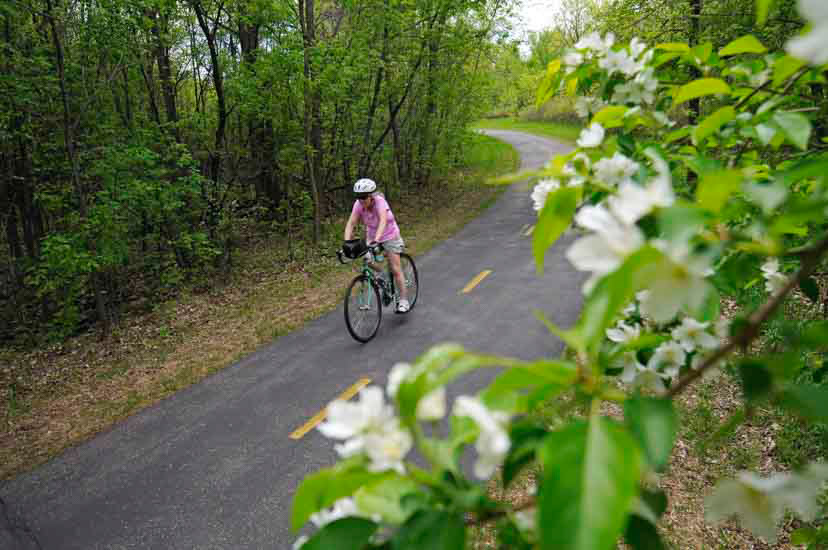 Biker on paved trail