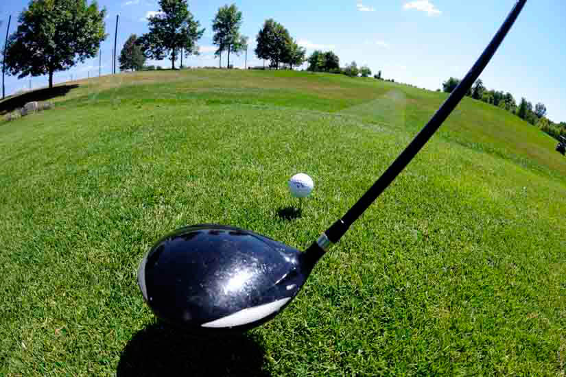 View of a fairway, golf club and ball