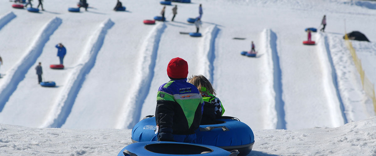 Kids waiting at the top of tubing hill
