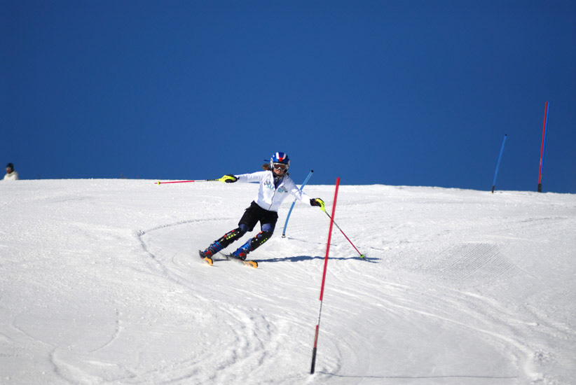 Skier in slalom gates