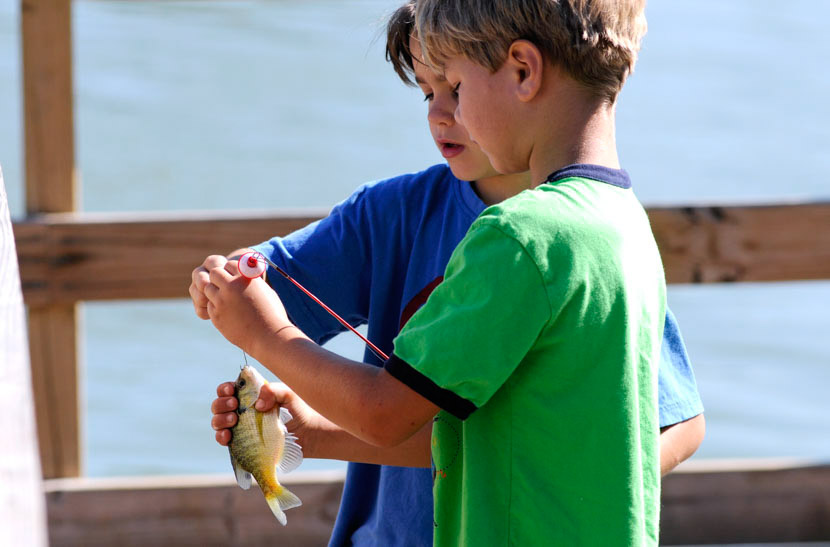Kids with fish