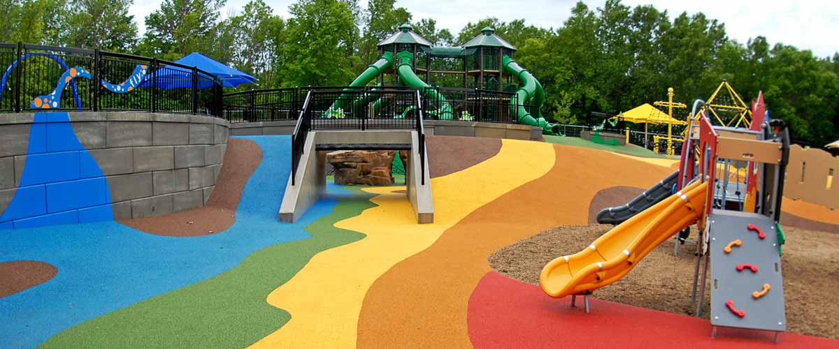 Colorful play area with slides and climbing strutures