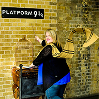 ashley wearing a scarf at platform nine and three quarters