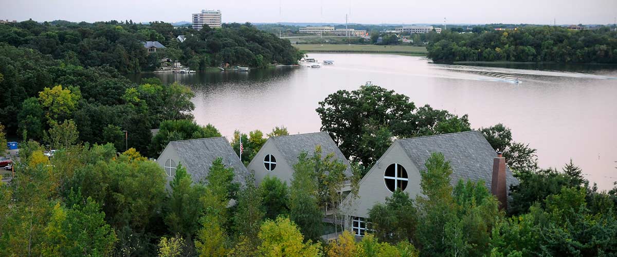 View of the Bryant Lake Visitor Center with Bryant Lake in the background.