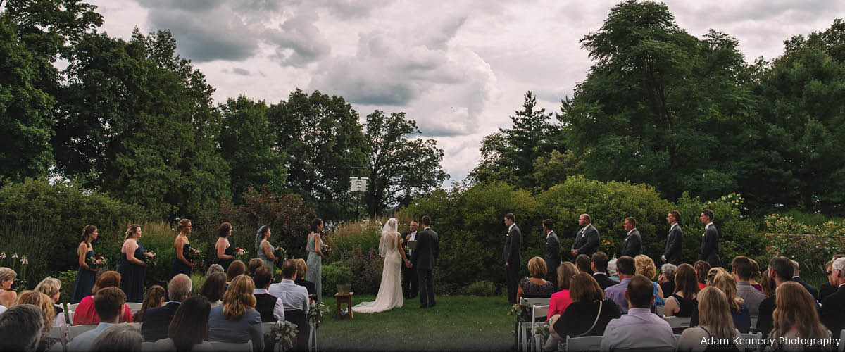 A wedding ceremony in a park.