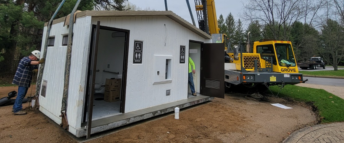 installation of the pre-fabricated restroom building at Noerenberg Gardens