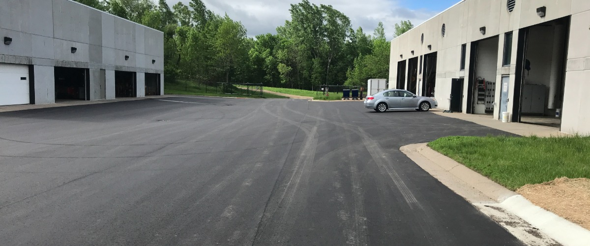 Newly paved road between Hyland Operations Center buildings