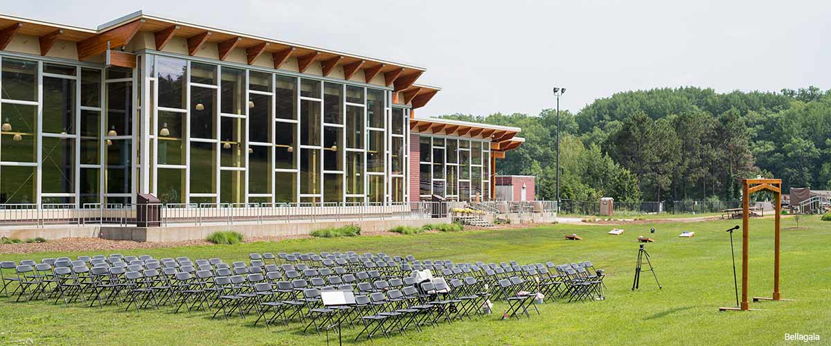 Photo of chairs set up for a wedding ceremony outside of the Hyland Hills Chalet.