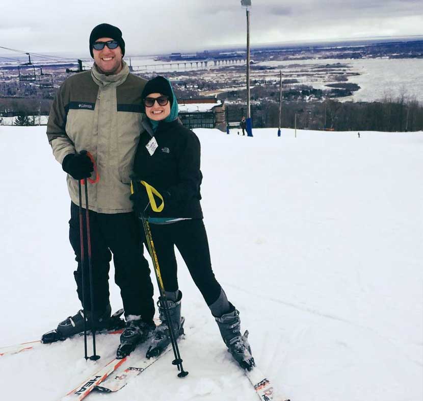 alyssa and her husband on downhill skis