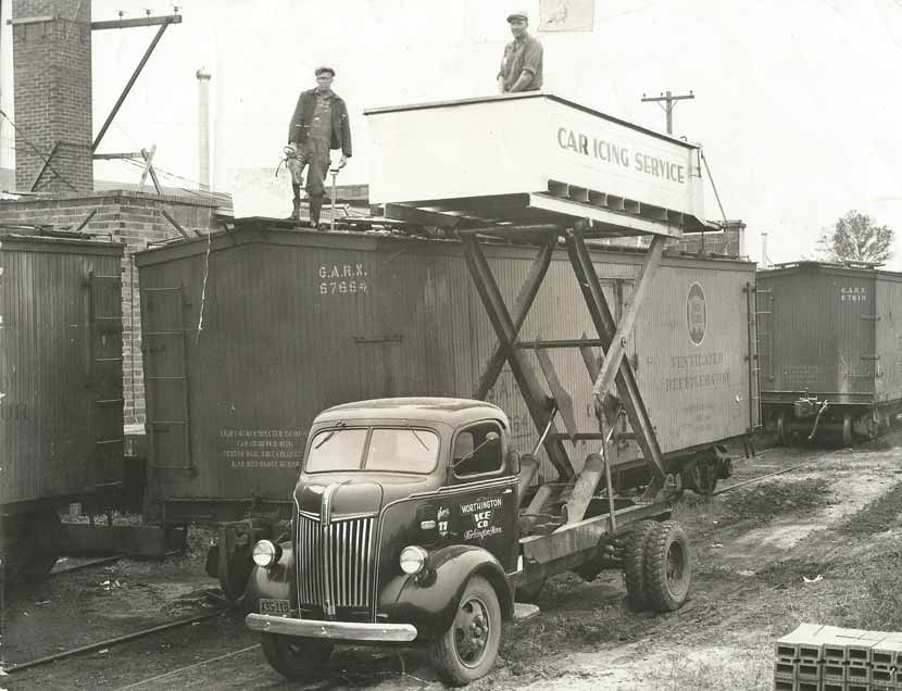 historic image of men icing a railroad reefer car in Worthington, Minnesota