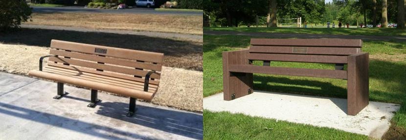 a light tan colored bench on a regional trail and a dark brown bench in the grass.