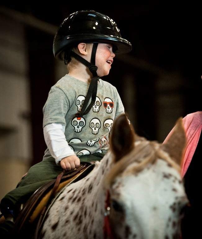 child on a horse