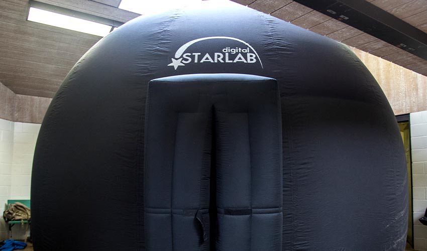 inflatable black dome that is the digital starlab