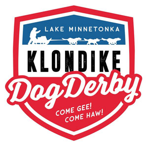 Klondike Dog Derby logo with text that says "Lake Minnetonka" and "Come Gee! Come Haw!" with an outline of a person being pulled on a sled by dogs.