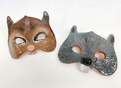 Photo of clay animal masks.