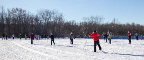 A photo of people learning to cross-country ski.
